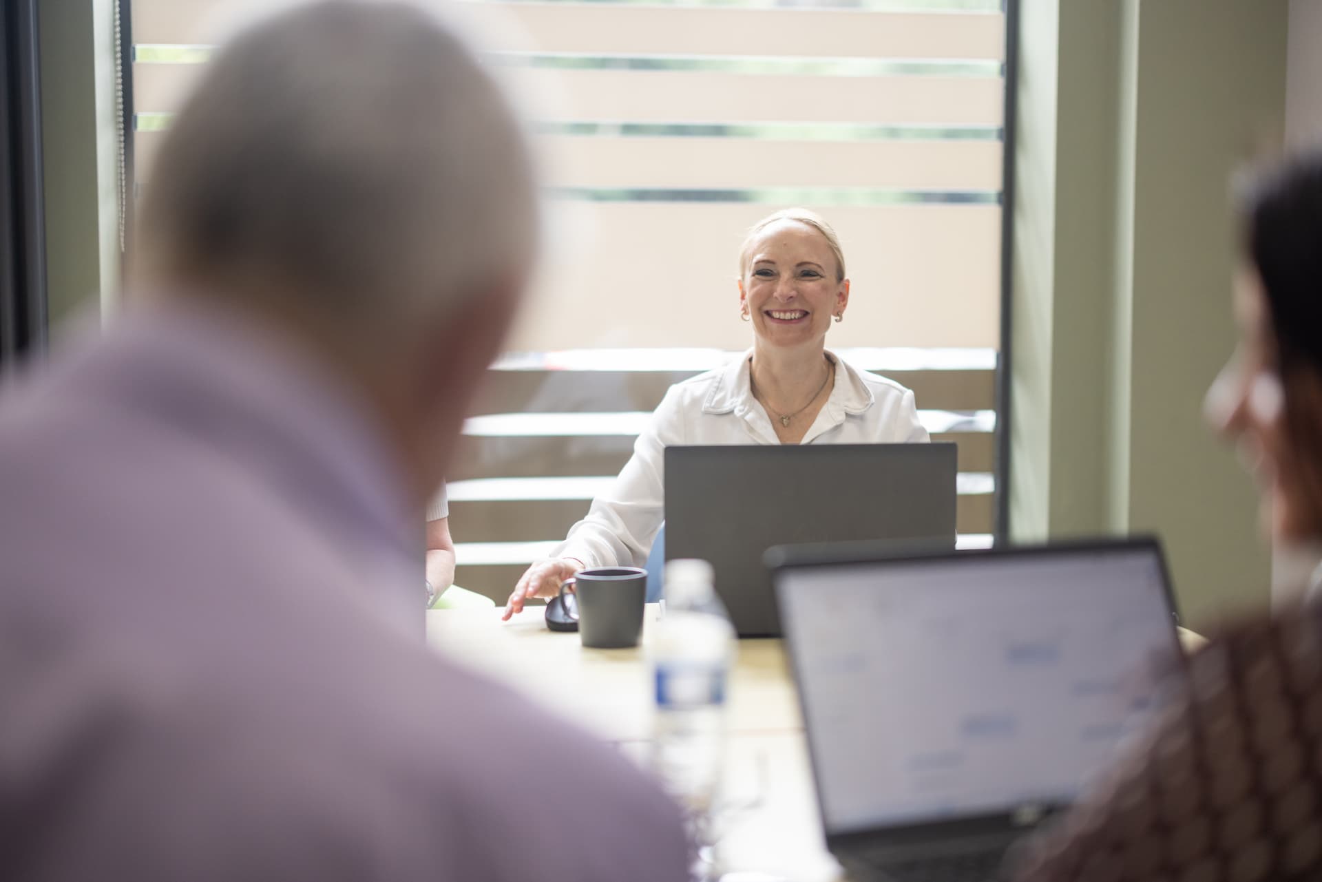 Heidi Turner in conversation during a business meeting