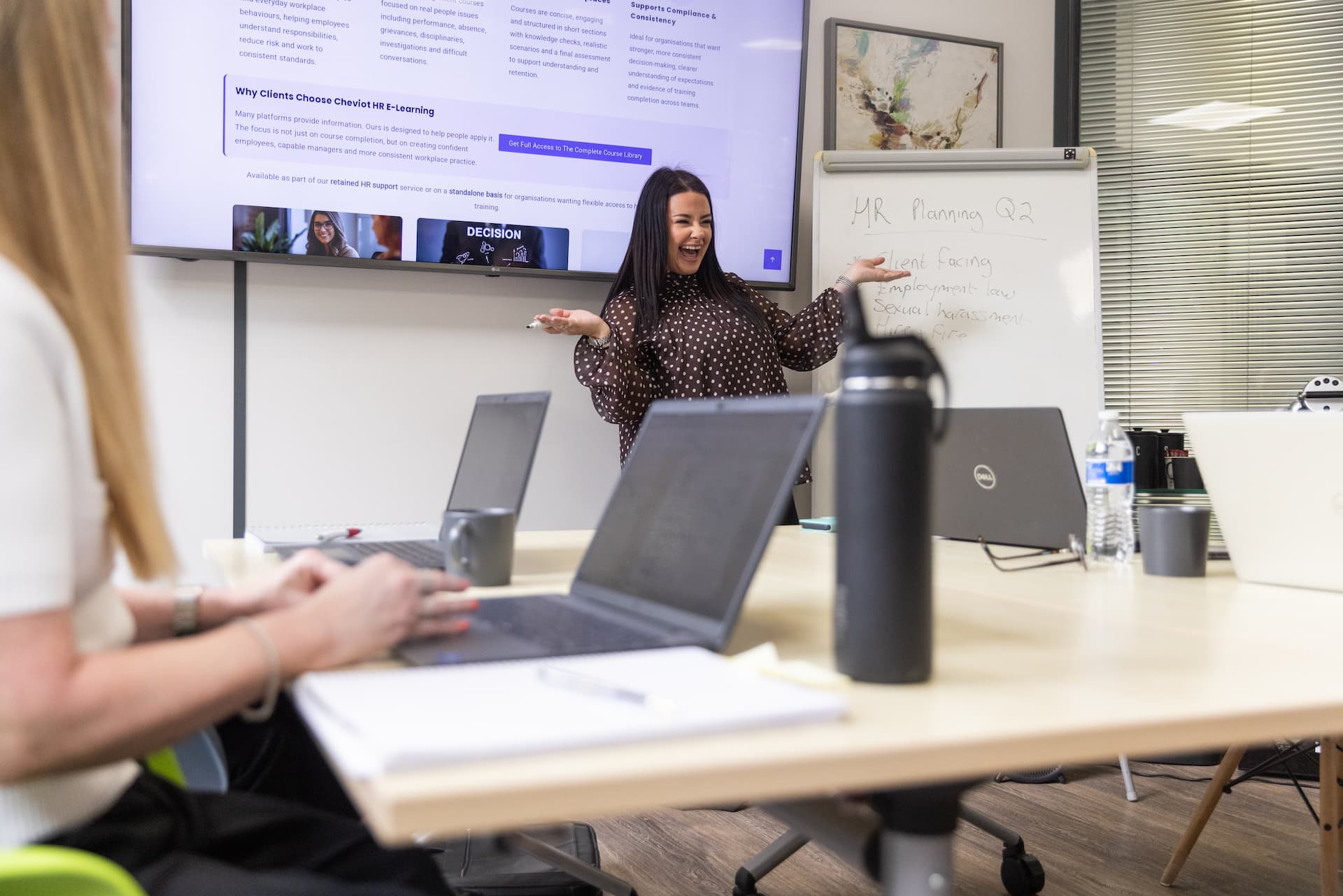 Cheviot HR consultant presenting during a business meeting