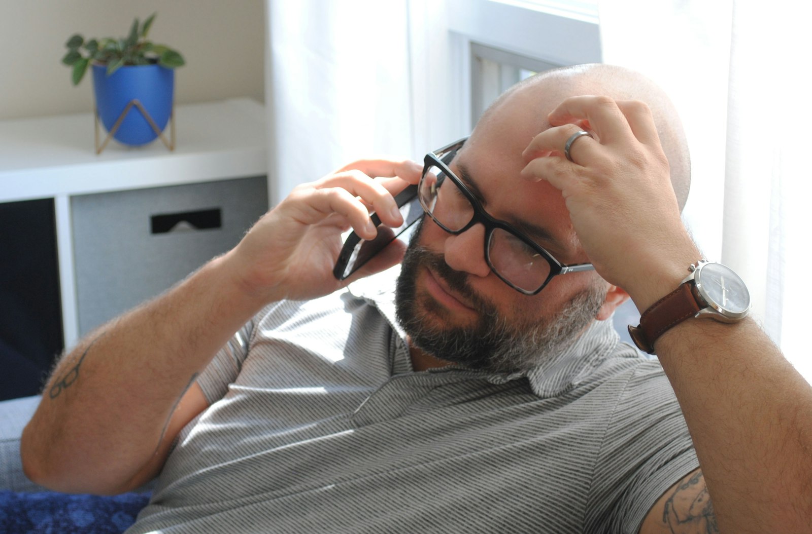 A worried business owner on the phone